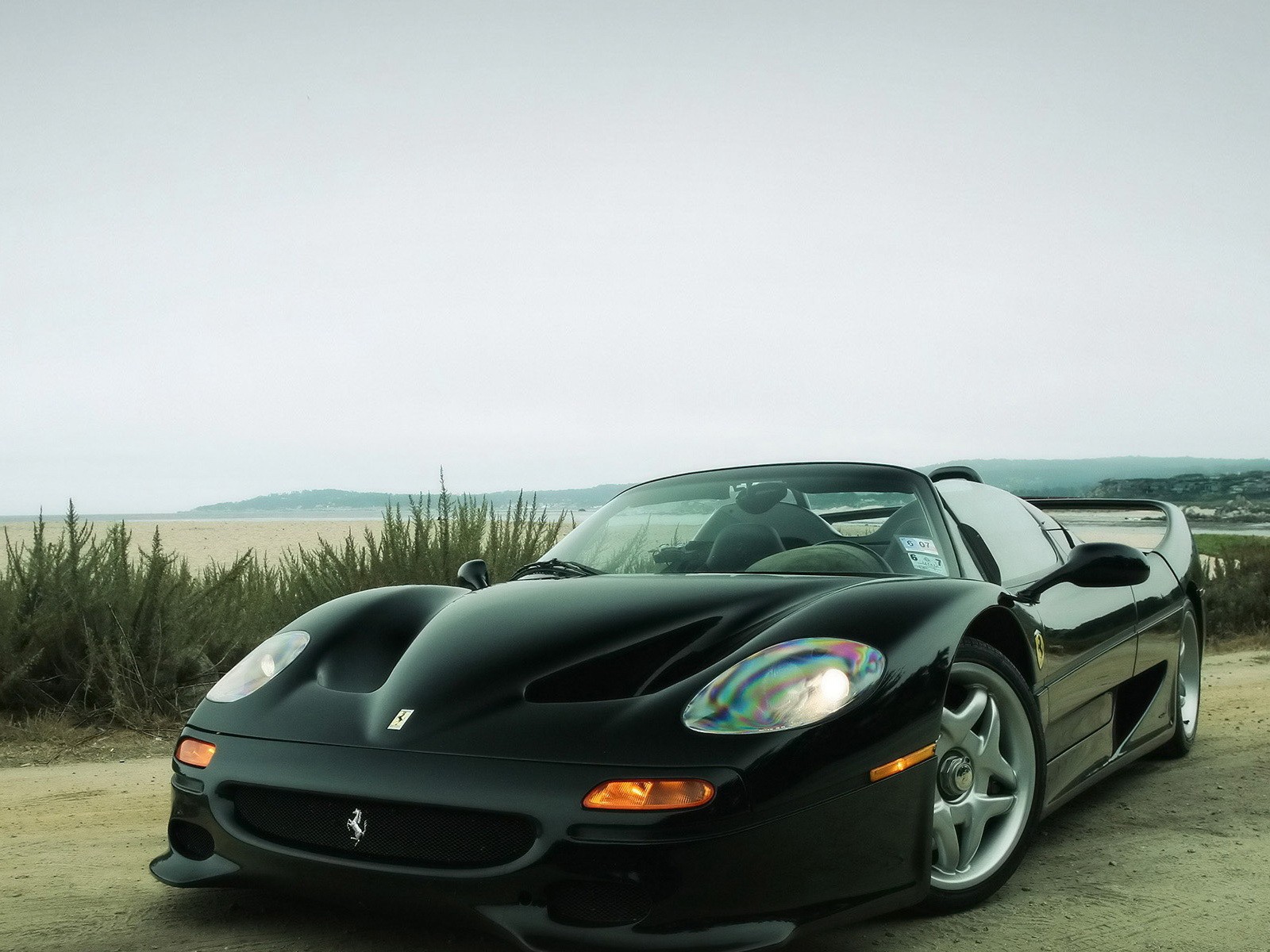 Ferrari convertible on the road wallpapers and images - wallpapers