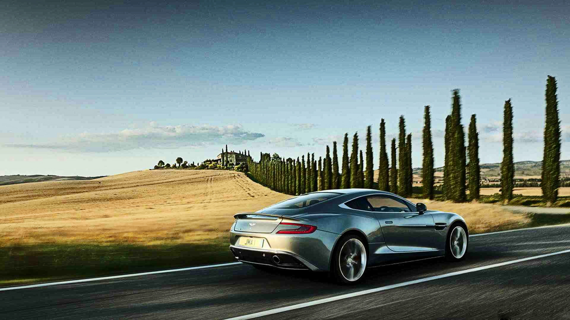 Download Beautiful Car Aston Martin Vanquish In Moscow Wallpapers And Images Wallpapers Pictures Photos PSD Mockup Templates
