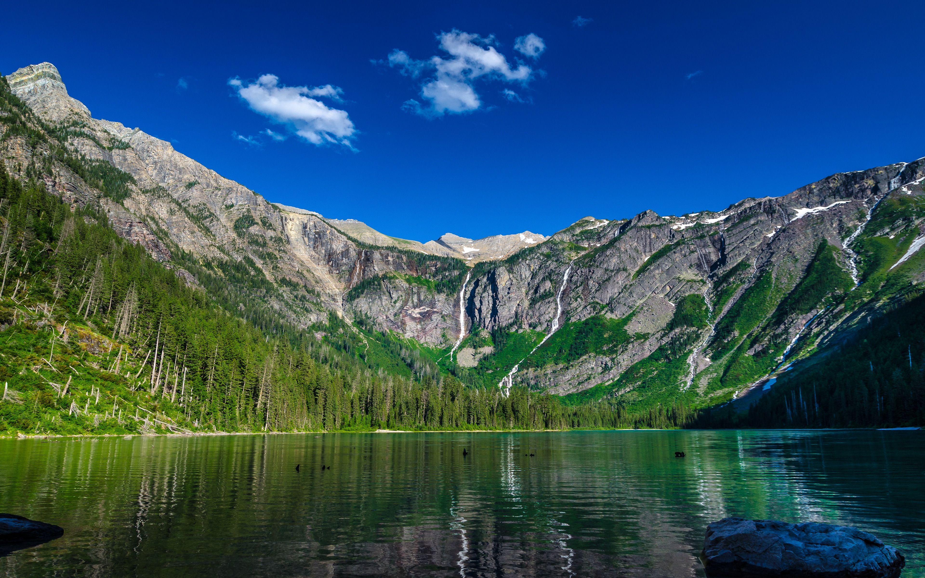 Горное озеро. Национальный парк Глейшер Монтана США. Шавлинские озера. Озеро Рица. Озеро св Марии в национальном парке Глейшер Монтана.