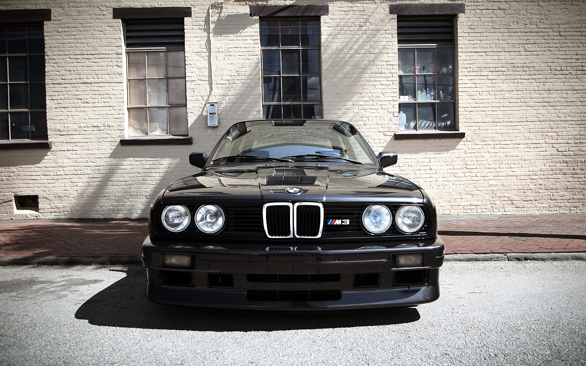 Black Bmw E 40 Near The Wall Wallpapers And Images Wallpapers Pictures Photos