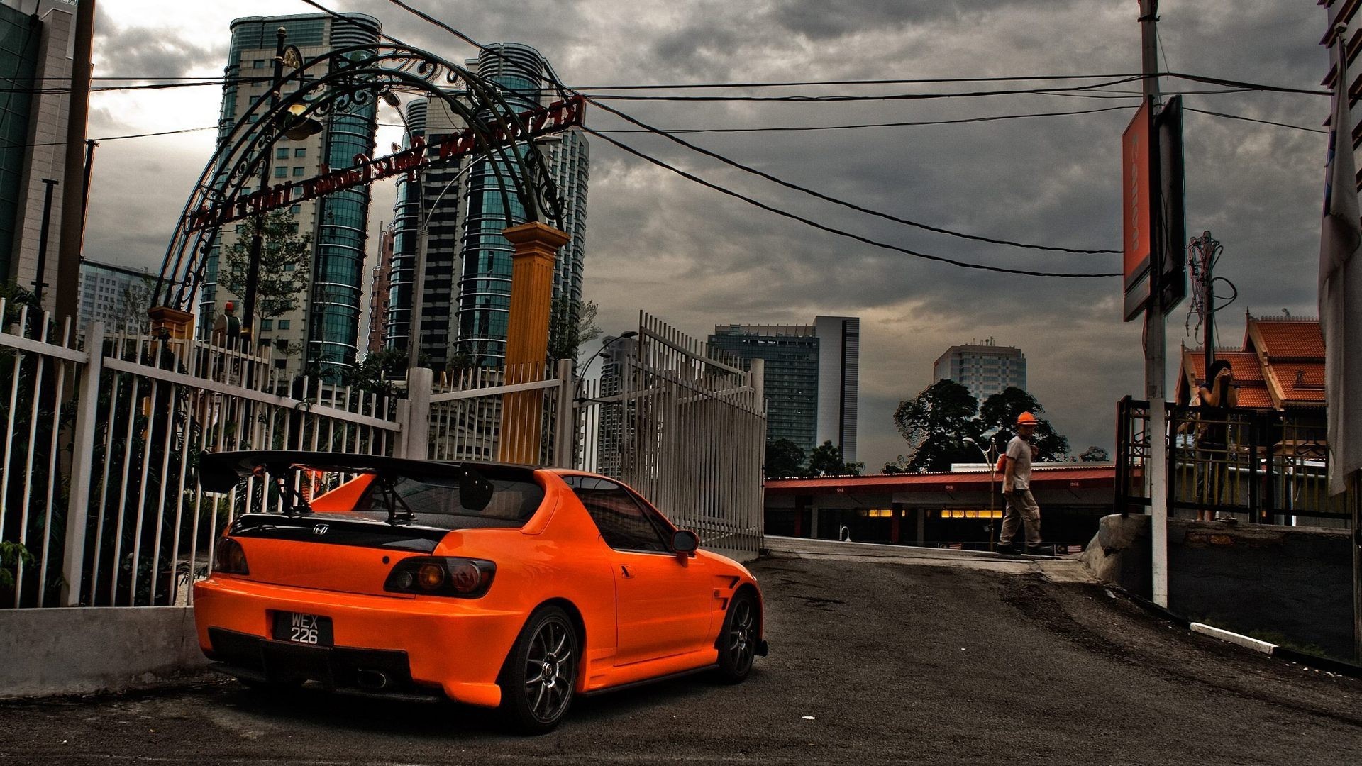 Zastaki.com - Оранжевая Хонда припаркована в городе