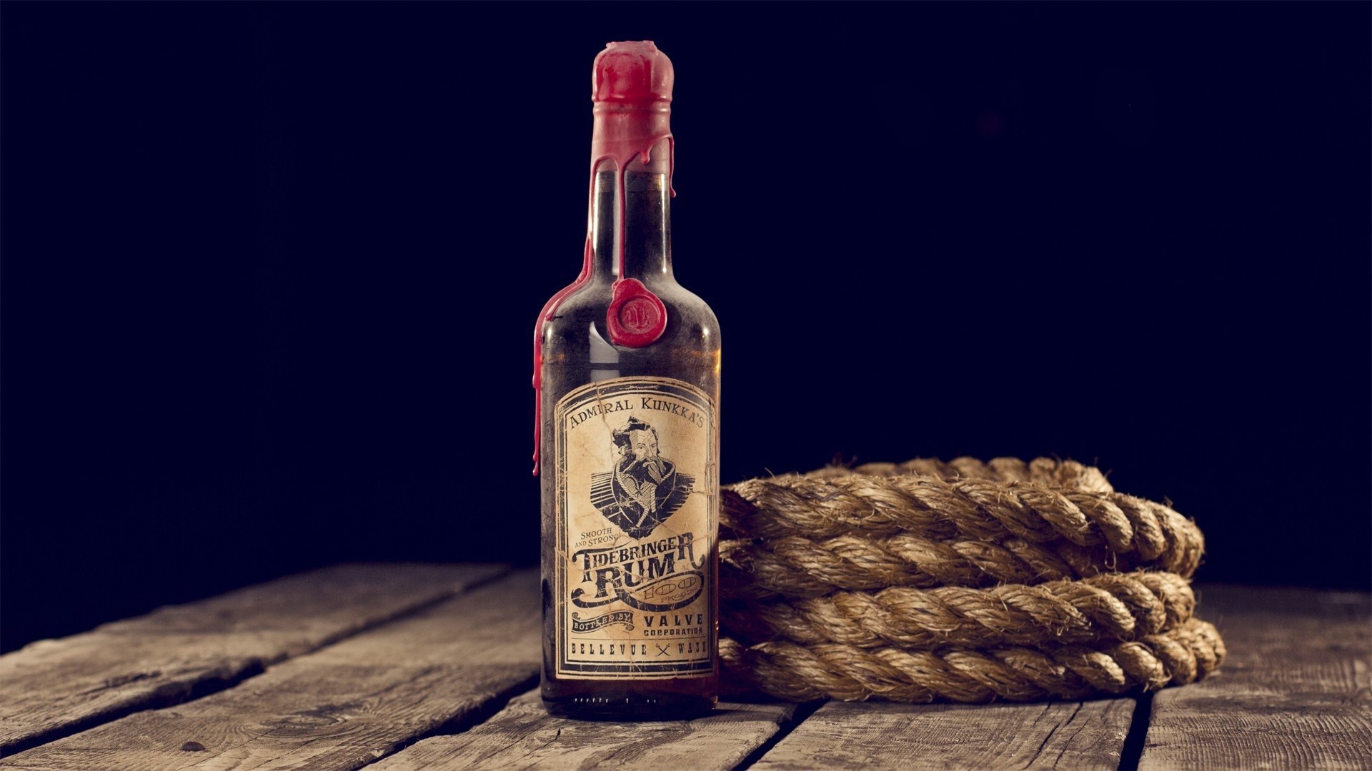 http://www.zastavki.com/pictures/originals/2015/Creative_Wallpaper_A_bottle_of_rum_and_ship_ropes_096078_.jpg