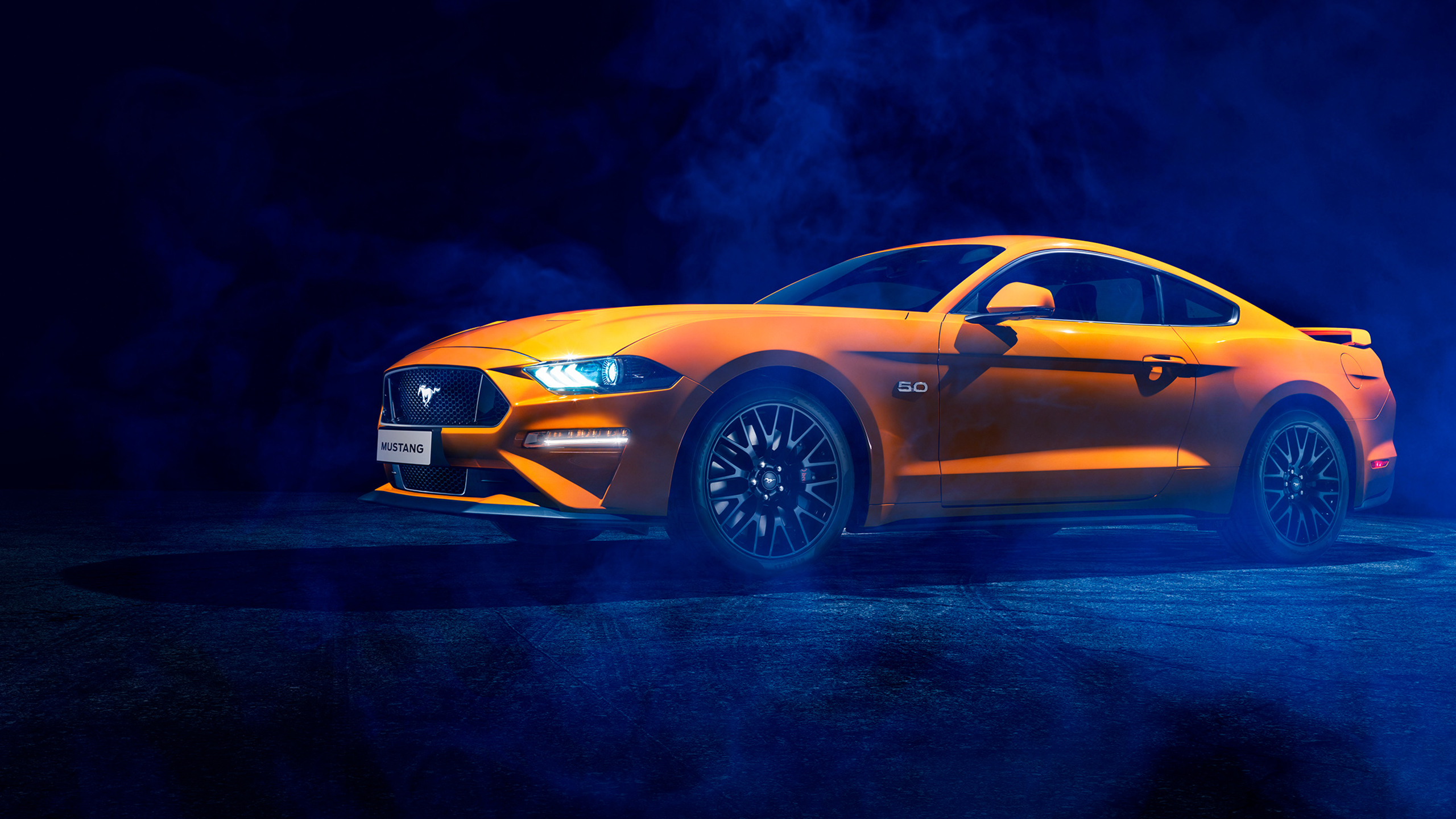 Orange Ford Mustang car in smoke Desktop wallpapers 1366x768