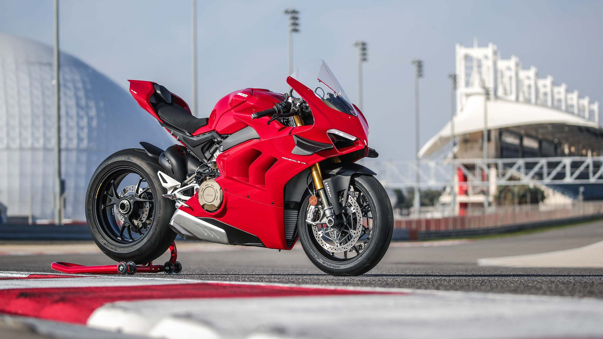 Red Ducati Panigale V4 S motorcycle, 2020 at the stadium Desktop wallpapers  1366x768